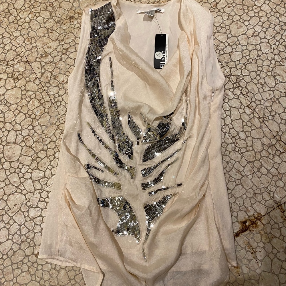 Beautiful blush color top with sequins.